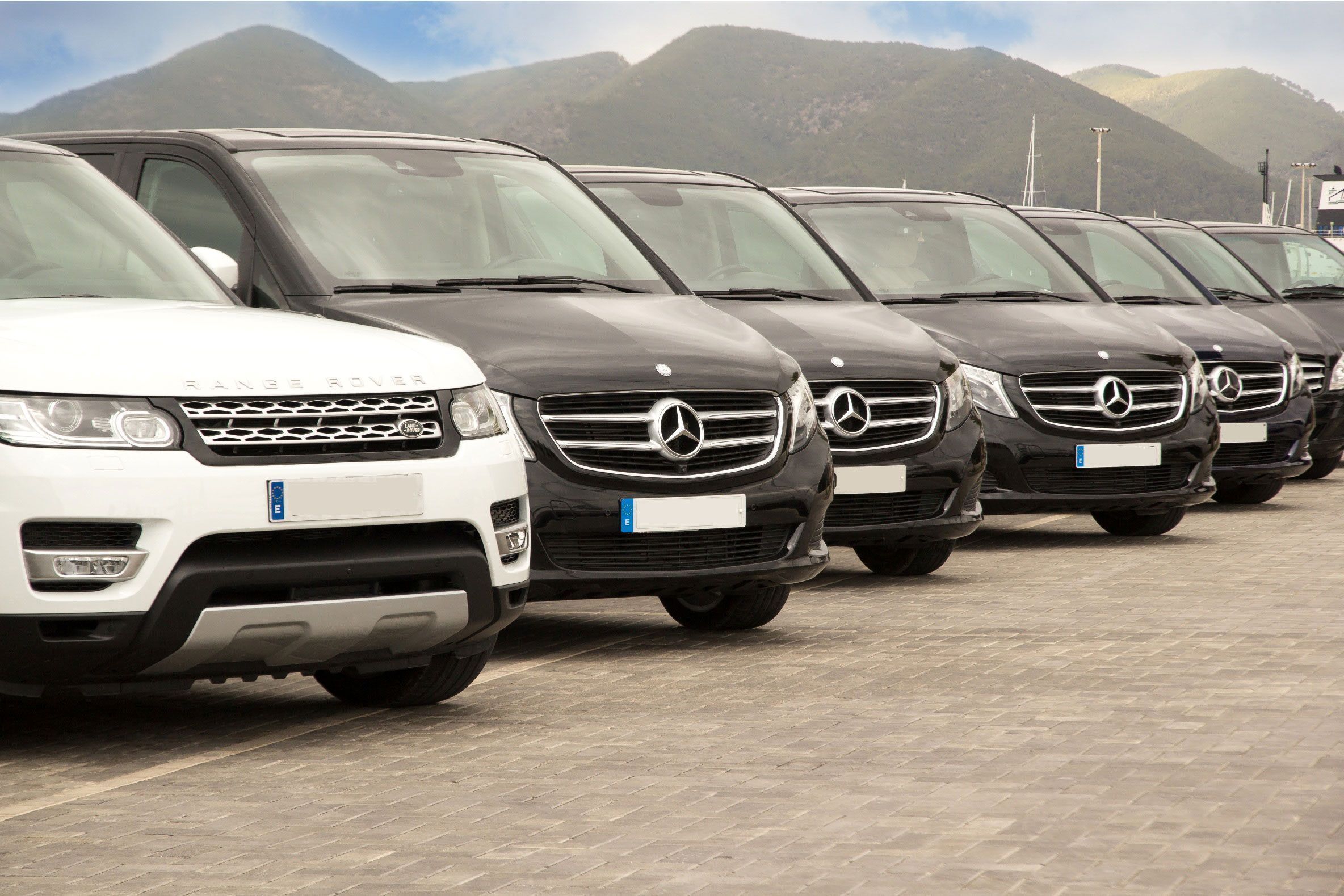 Luxury fleet parked waiting for VIP customers