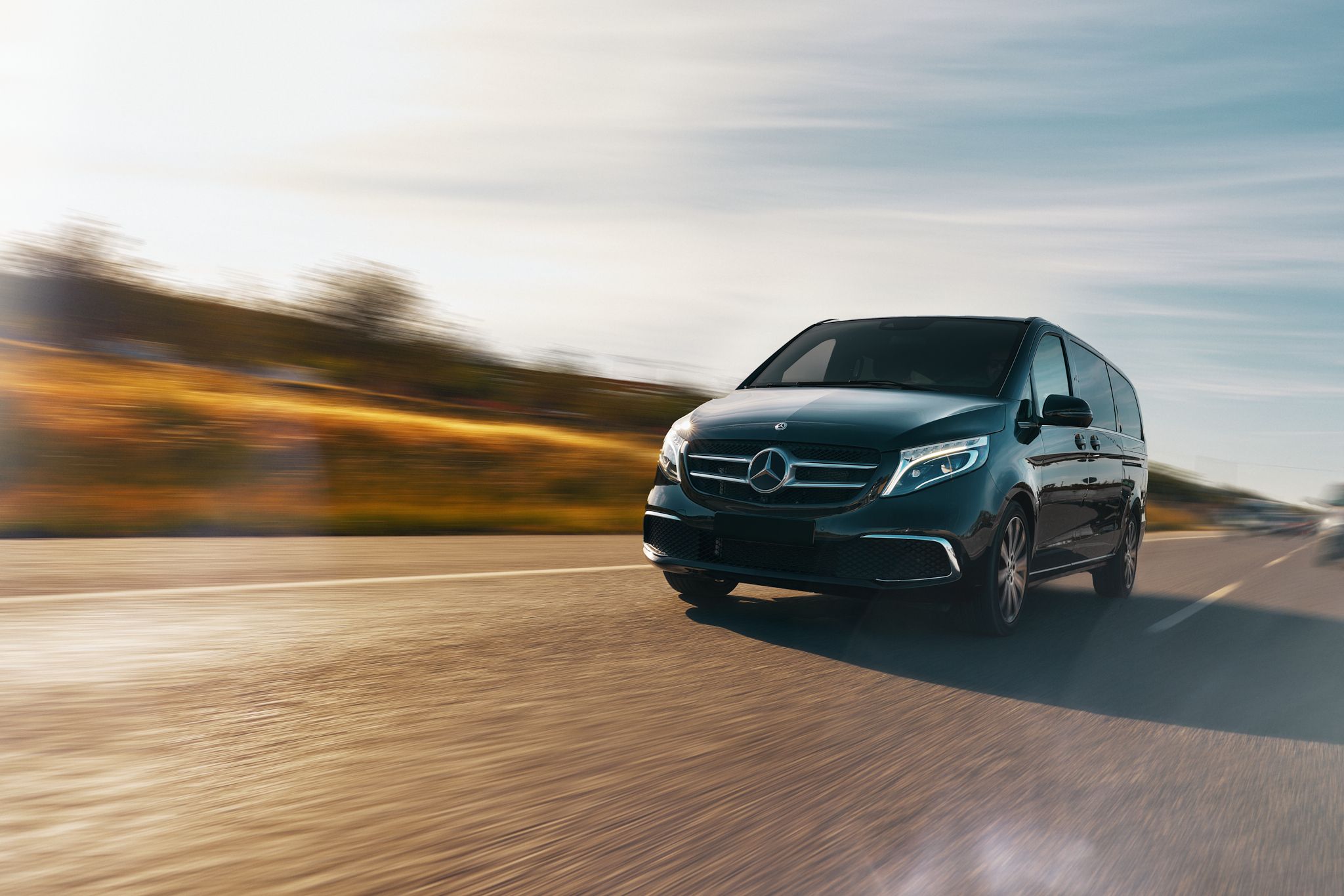 Luxury Mercedes Van 7 passengers driving in Mallorca road